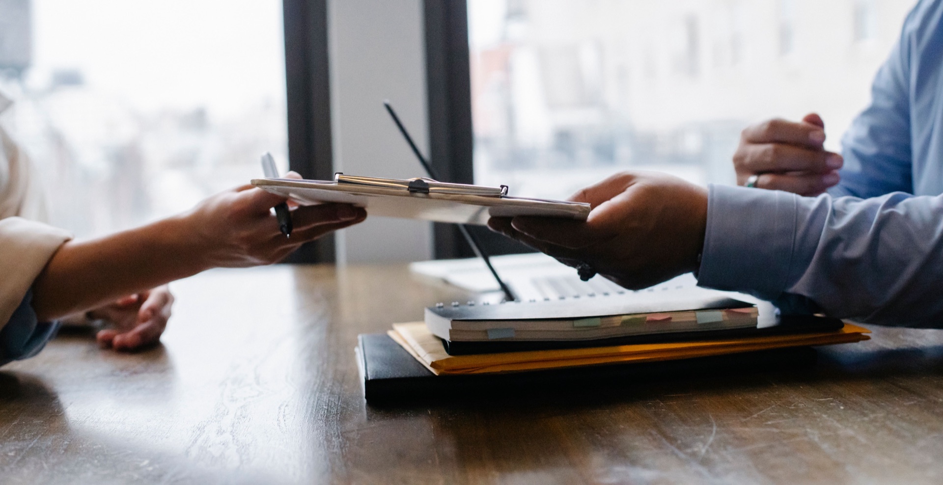 Finance professional completing a retained service agreement