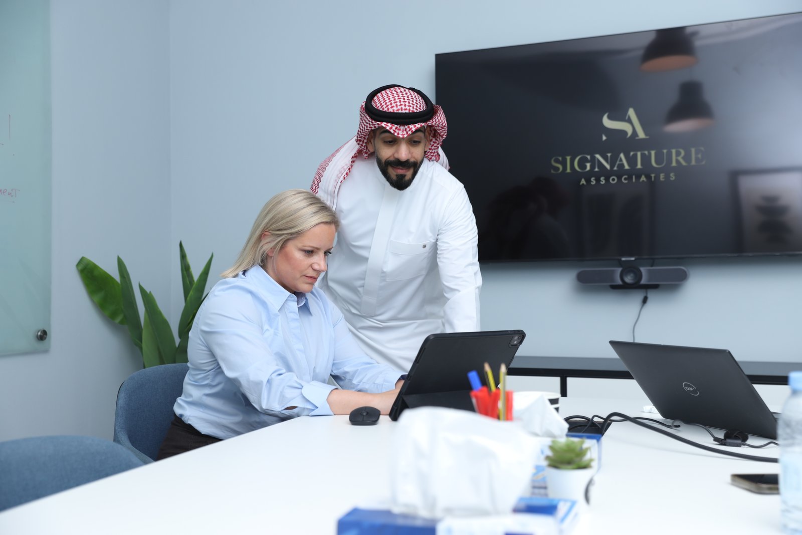 Signature Associates KSA team in boardroom